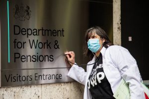Colour photo of Dolly Sen sectioning the DWP