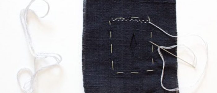 picture of square of fabric with running stitch